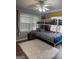 Bedroom featuring a large bed with a rug, and natural light at 2791 Biscayne Dr, Conyers, GA 30012