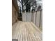 A spacious wooden deck with privacy lattice is perfect for outdoor enjoyment at 2791 Biscayne Dr, Conyers, GA 30012