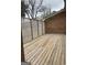 A spacious wooden deck with privacy lattice is perfect for outdoor enjoyment at 2791 Biscayne Dr, Conyers, GA 30012