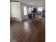 Open dining area with modern table and chairs adjacent to an updated kitchen at 2791 Biscayne Dr, Conyers, GA 30012