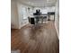 An open-concept dining room features hardwood floors and bright, natural light at 2791 Biscayne Dr, Conyers, GA 30012
