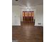 Inviting entryway with striking stained glass double doors and wood flooring at 2791 Biscayne Dr, Conyers, GA 30012