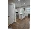 Bright eat-in kitchen boasts a large center island, pendant lighting and bar seating at 2791 Biscayne Dr, Conyers, GA 30012