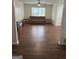 Spacious living room features hardwood floors, neutral paint, and modern furnishings at 2791 Biscayne Dr, Conyers, GA 30012