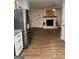 Inviting living room with brick fireplace and hardwood floors at 2791 Biscayne Dr, Conyers, GA 30012