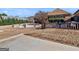 Sparse backyard with lush green grass, patio, and privacy fencing at 200 Magnolia Ct, Mcdonough, GA 30252