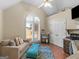 Bedroom with arched window, seating, and a ceiling fan, creating a cozy atmosphere at 200 Magnolia Ct, Mcdonough, GA 30252