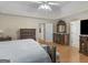 Spacious main bedroom with hardwood floors, decorative molding and elegant furniture at 200 Magnolia Ct, Mcdonough, GA 30252