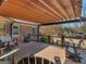Wood deck offers an area for outdoor relaxation and entertaining with wood railings and a shade structure at 200 Magnolia Ct, Mcdonough, GA 30252