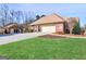 Charming brick home with well-manicured lawn, attached garage, and separate entry building at 200 Magnolia Ct, Mcdonough, GA 30252