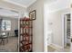 Hallway displaying a towel rack and views into the bedroom and bathroom at 200 Magnolia Ct, Mcdonough, GA 30252
