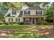 Charming two-story home with green shutters and a welcoming front porch at 100 Williams Blf, Mcdonough, GA 30252