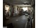 View of a living room with missing walls and insulation exposed at 65 Little John Trl, Hampton, GA 30228