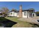 Backyard of a charming home featuring an outbuilding and detached garage at 34 Ivy St, Porterdale, GA 30014