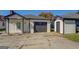 Charming home featuring a garage and outbuilding at 34 Ivy St, Porterdale, GA 30014
