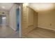 Bright laundry room with vinyl flooring and hookups ready for appliances at 34 Ivy St, Porterdale, GA 30014