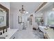 Spacious bathroom with soaking tub, double sink vanity, and stylish fixtures at 3320 Lost Valley Dr, Jonesboro, GA 30236