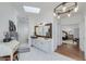 Bright bathroom featuring a walk-in shower, skylight, and modern fixtures at 3320 Lost Valley Dr, Jonesboro, GA 30236