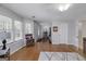 Bedroom with hardwood floors, bright natural light, and workout space at 3320 Lost Valley Dr, Jonesboro, GA 30236