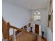 Grand foyer with high ceilings, staircase, chandelier, and hardwood floors at 3320 Lost Valley Dr, Jonesboro, GA 30236