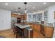 Bright kitchen boasts stainless steel appliances, a center island with seating, and granite countertops at 3320 Lost Valley Dr, Jonesboro, GA 30236