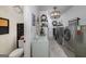 Modern laundry room offering new appliances, storage, and unique decor at 3320 Lost Valley Dr, Jonesboro, GA 30236