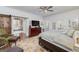 Bright main bedroom features French doors, ensuite bath and stylish rug at 3320 Lost Valley Dr, Jonesboro, GA 30236