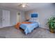 This is a picture of a carpeted bedroom with natural lighting and neutral paint at 106 Kirkland Rd, Covington, GA 30016