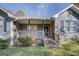 Welcoming front porch with stone accents and stairs leading to the entrance of the house at 106 Kirkland Rd, Covington, GA 30016