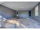 Spacious garage with a concrete floor, offering ample parking or storage space at 106 Kirkland Rd, Covington, GA 30016