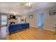 Comfortable living room with hardwood floors, a stone fireplace, and neutral walls, offering a cozy space at 106 Kirkland Rd, Covington, GA 30016