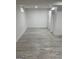 Finished basement with light gray wood-look floors at 851 Bridgewater Ct, Stone Mountain, GA 30088