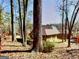 Cabin home situated in wooded location at 851 Bridgewater Ct, Stone Mountain, GA 30088