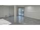 The living room features light gray tile and sliding glass doors to the outside at 851 Bridgewater Ct, Stone Mountain, GA 30088