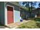 Backyard patio with seating and grill, perfect for outdoor entertaining at 121 Juniper Dr, Mcdonough, GA 30253