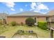 Well-maintained backyard with lush greenery and a variety of plantings, offering a peaceful outdoor retreat at 2733 Newtons Crest Cir, Snellville, GA 30078