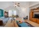 Spacious living room with vaulted ceiling, large windows, and comfortable seating area, perfect for relaxation at 2733 Newtons Crest Cir, Snellville, GA 30078
