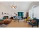 Cozy living room with a fireplace, plush seating, and natural light, ideal for entertaining guests at 2733 Newtons Crest Cir, Snellville, GA 30078