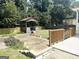 The backyard features a covered gazebo-like structure with access from a concrete patio at 6544 Bussell Way, Riverdale, GA 30274