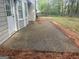 Exterior view of a concrete back patio for outdoor living at 260 Countryside Ln, Covington, GA 30016