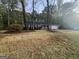 Inviting single-story home featuring a well-manicured lawn and convenient two-car garage at 260 Countryside Ln, Covington, GA 30016