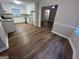 Modern kitchen features wood floors and stainless steel appliances at 260 Countryside Ln, Covington, GA 30016