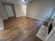Cozy living room includes fireplace and wood-look floors at 260 Countryside Ln, Covington, GA 30016