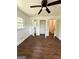 Hardwood floors, closet and an additional room visible in the background make this space feel larger at 1322 S Hicks Cir Nw, Conyers, GA 30012