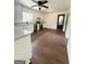 The kitchen features white cabinets, stainless steel appliances, and modern fixtures at 1322 S Hicks Cir Nw, Conyers, GA 30012