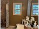 Bathroom featuring a shower stall, vanity with modern fixtures, and a window for natural light at 2387 Shire Ct, Austell, GA 30106