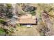 Birds eye view of the house shows roof, trees and driveway at 5217 Hollyhock Rd, Douglasville, GA 30135