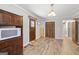 Bright dining area with wooden accents, leading to doorway and window at 5217 Hollyhock Rd, Douglasville, GA 30135