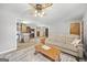 Open-concept living room flowing into the kitchen, great for entertaining and everyday living at 5217 Hollyhock Rd, Douglasville, GA 30135