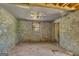 Spacious basement with stone walls, vintage window and peeling ceiling, offering a unique canvas for renovation and personalization at 2255 Beecher Sw Rd, Atlanta, GA 30311